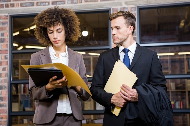 lawyer businesswoman looking documents office 107420 12588